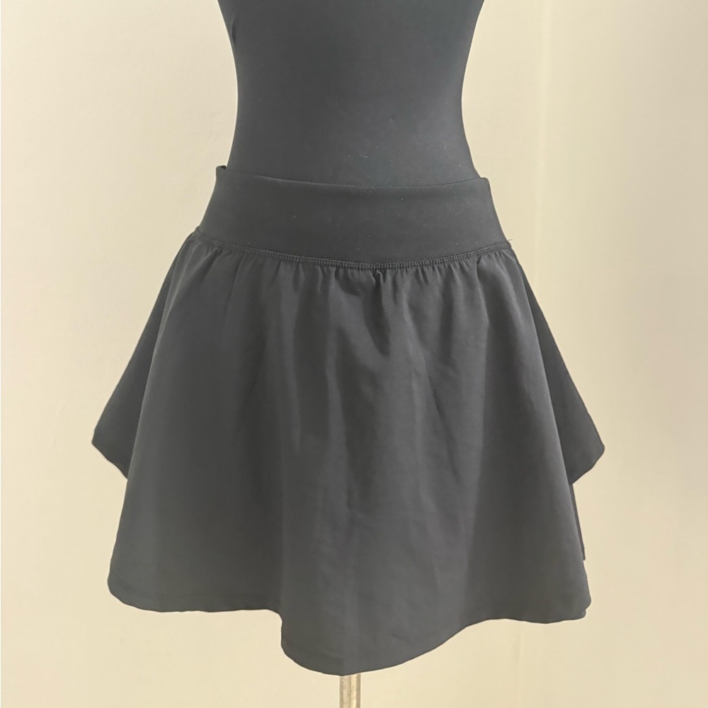 Sport Skirt- Jessica Simpson. 
I haven’t even used it. I bought it for a travel.